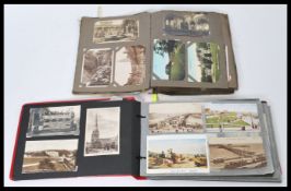 Postcards; two albums of assorted postcards - largely 1910-1981 - all send to the same recipient