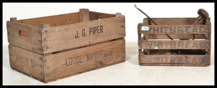 A vintage early 20th century sack barrows together with a group of vintage wooden shipping crates.