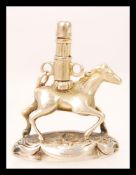 A unmarked but 9ct gold testing fob seal pendant having a bloodstone agate seal with horse