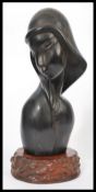 An early 20th century Chinese hardwood hand carved bust figurine of a lady raised on wooden base.