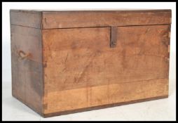 A vintage 19th century hardwood trunk storage blanket box having a hinged lid opening to reveal a