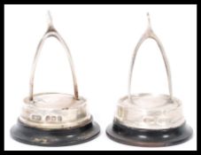 A pair of silver hallmarked novelty wishbone menu holders raised on circular bases. Hallmarked for
