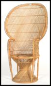 A good 20th century vintage / retro wicker peacock armchair -chair. Large open back chair with woven