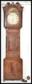 A 19th century Victorian North Country oak and mahogany thirty hour longcase clock. The hood