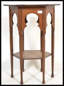 A Victorian Arts & Crafts mahogany hexagonal occasional table in the manner of Godwin. Raised on