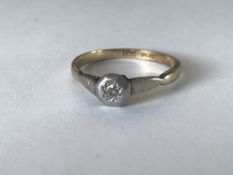 A hallmarked 9ct gold and ruby cluster ring. Hallmarked London. Weight 2.4g. Size N