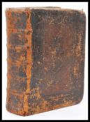 An 18th century Bible being leather bound with notation to blank pages at the back dating to