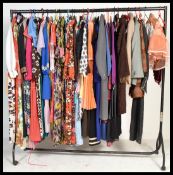 A collection of vintage clothing to include a beaded serenade evening dress, hand fashioned kitted