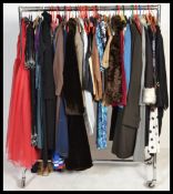 A collection of vintage clothing to include ladies confezioni leather jacket, dinner suit with