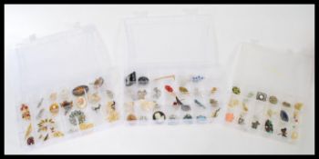 A good collection of 60 plus vintage costume jewellery brooches to include many named examples,