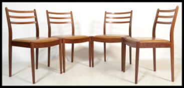 A set of four vintage retro 20th century G-Plan Fresco range dining chairs having ladder back