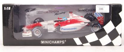 MINICHAMPS 1:18 SCALE DIECAST MODEL FORMULA ONE CA