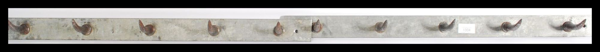 A pair of vintage 20th century steel butchers meat