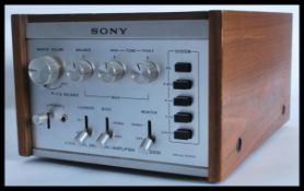 A retro 20th century  teak cased Sony 4 / Quadraph