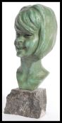 A 20th century continental bust of a young girl by