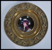 A 19th century hand painted porcelain enamel plaqu