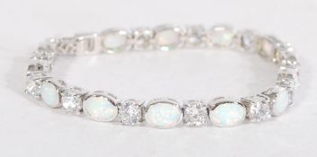 A sterling silver and opal panel tennis bracelet h