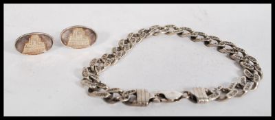 A 925 silver and CZ curb chain link bracelet toget