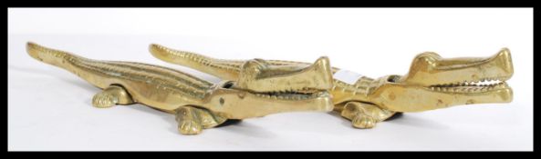 A pair of large 20th century cast brass novelty nu