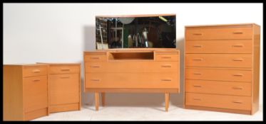 A vintage retro 20th century light teak bedroom su