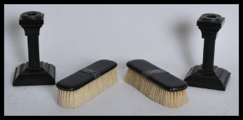 An early 20th century Art Deco ebony and silver mo