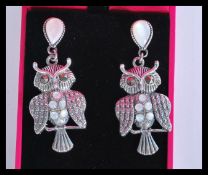 A pair of sterling silver and marcasite earrings i