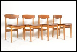 A set of 4 vintage mid 20th century teak wood dini