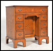 A good Queen Anne revival yew wood and oak inlaid