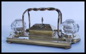 A 19th century Victorian brass gothic desktop Stan