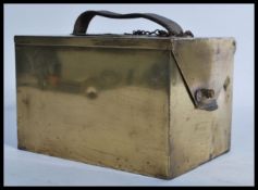 An early 20th century brass cased pigeon racing cl