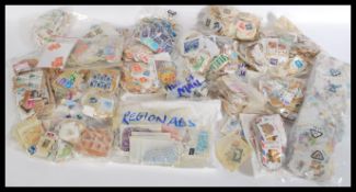 STAMPS: Kiloware. Massive quantity weighing 14kgs