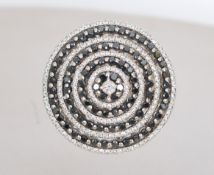 An 18ct white and yellow gold diamond designer sta