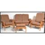 A vintage retro 20th century Ercol three piece sui
