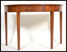 A Georgian 19th century mahogany demi lune console