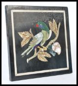 A 19th century Italian Petra Dura panel of a parro