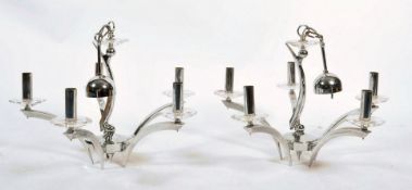 A pair of 1970's Scandinavian chrome ceiling chand