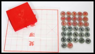 A set of thirty two Chinese jade gaming counters /