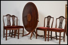 An early 20th century Edwardian plum mahogany and