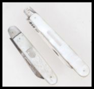 Two silver hallmarked and mother of pearl fruit kn