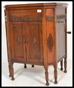 A vintage early 20th century oak cased gramophone