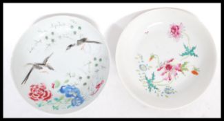 An 18th century Yongzheng period Chinese porcelain plate  with hand enamelled flowers and birds with