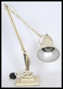A vinatge retro 20th century 1940's Industrial pre-war Herbert Terry anglepoise desk lamp, raised on