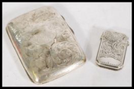 A silver hallmarked small vesta case of octagonal from having chased decoration along with a