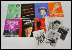 A collection of mid 20th century 1950's and 1960's music programs to include an Adam Faith program