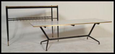 A vintage mid 20th Century ebonised  metal tubular framed atomic coffee table together with a