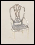 A 20th century silver chair miniature ornament.