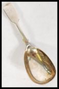 A 19th century Victorian silver hallmarked caddy spoon in the fiddle pattern being hallmarked Robert
