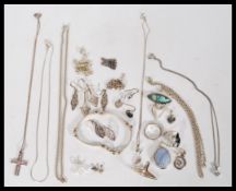 A collection of vintage 20th century silver jewellery to include a 16 inch long silver anchor link