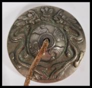A pair of 19th century Mongolian Tsan cymbals musical instruments of bronze construction along