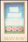 A Man Ray framed print of peaches on paper in front of a painterly background in a glazed wooden